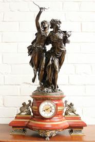 bronze and marble clock with statue 19th century