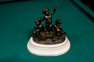 Angels in bronze on marble base