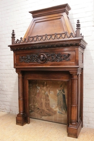 Gothic style fire mantle in walnut