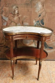Mahogany and bronze center table with marble top