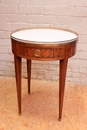 Marble top inlay table with bronze