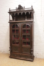 Renaissance jester display cabinet in walnut with beveled glass