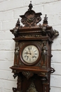 Renaissance style Clock in walnut and bronze, France 19th century