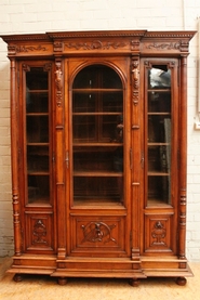 3 door walnut Henri II bookcase