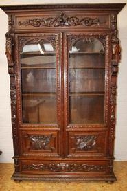 Oak figural hunt bookcase 19th century