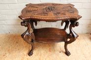 Walnut renaissance dragon center table 19th century