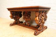 Oak Renaissance figural center table 19th century