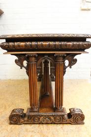 walnut renaissance center table 19th century