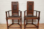 pair of walnut gothic arm chairs 19th century