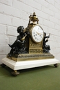 style Clock in Bronze and marble, France 19th century