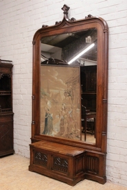 Exceptional monumental gothic mirror bench in walnut