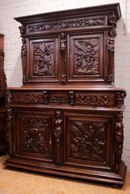 Figural renaissance style cabinet in walnut