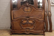 Louis XV bed in walnut