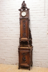 Louis XV grandfather clock in walnut with joker and cherub