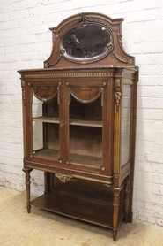 Louis XVI display cabinet in walnut with gilt accents