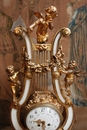 Louis XVI style Mantle clock set in Bronze and marble, France 19th century