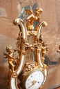 Louis XVI style Mantle clock set in Bronze and marble, France 19th century