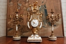 Louis XVI style Mantle clock set in Bronze and marble, France 19th century