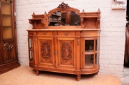 Louis XVI style bombe cabinet in walnut withe marble top and beveled glass