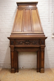 Monumental renaissance fire mantle in walnut