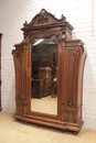 Monumental single door regency style armoire in walnut