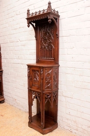 Narrow gothic cabinet in walnut