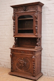 Narrow hunt cabinet in oak