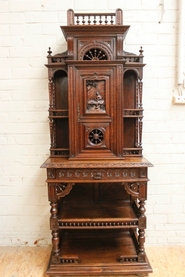 narrow oak breton cabinet