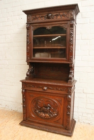 Narrow oak hunt cabinet