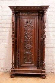 Narrow renaissance cabinet in walnut