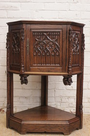 Oak gothic corner cabinet