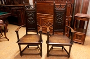 Pair oak gothic arm chairs