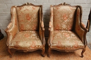 Pair walnut and gilt Louis XV bergeres