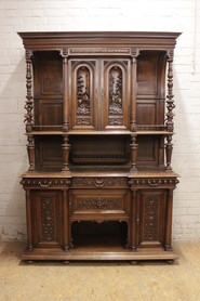 Renaissance style jester cabinet in walnut