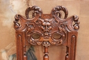 Renaissance style Chairs and arm chairs in Walnut, France 19th century