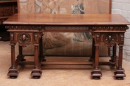 Special walnut renaissance desk with faces