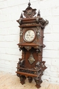 Renaissance style Clock in walnut and bronze, France 19th century