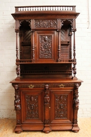 Walnut figural renaissance cabinet